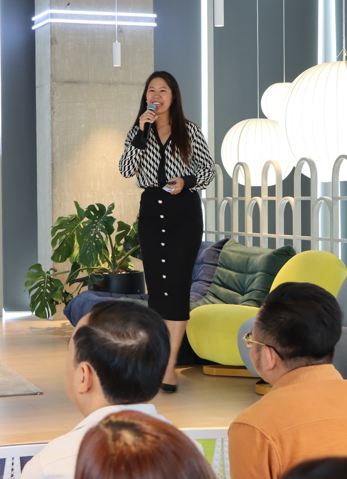 Professional presentation setup with microphone and laptop